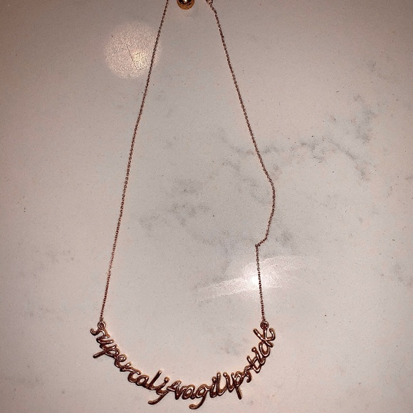 kate spade Jewelry - Kate Spade "Supercalifragilipstick" gold necklace